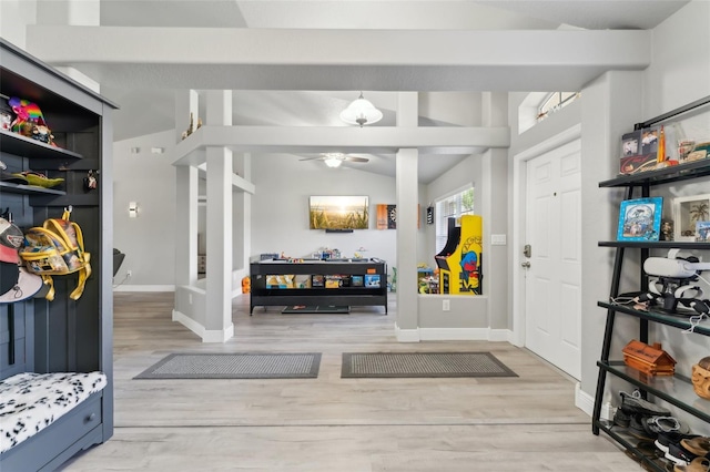 mudroom with baseboards, a ceiling fan, vaulted ceiling, and wood finished floors