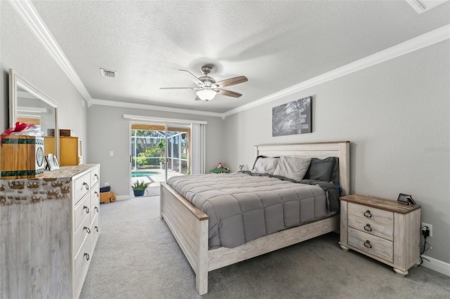 bedroom with crown molding, visible vents, light carpet, a textured ceiling, and access to outside