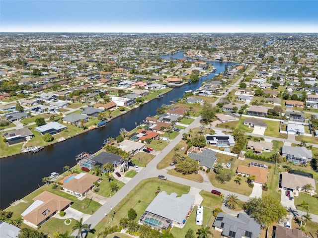 aerial view with a water view and a residential view