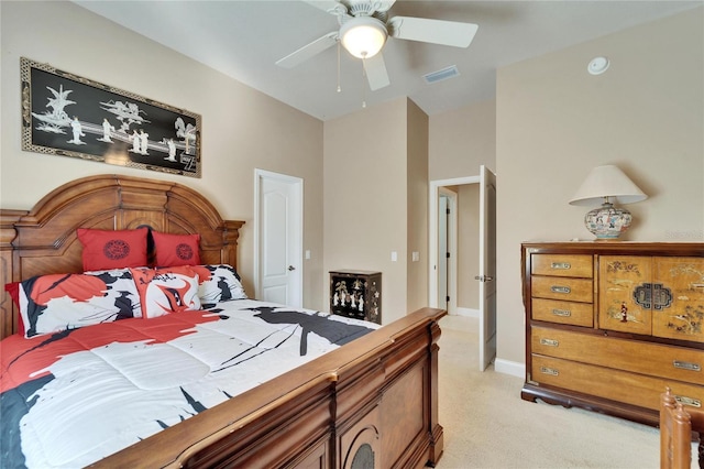 bedroom with a ceiling fan, visible vents, and baseboards