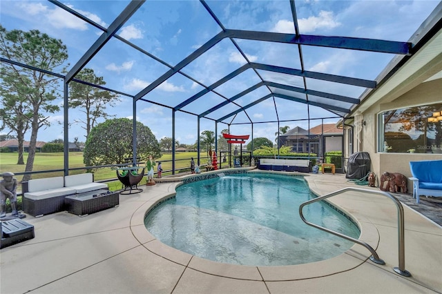 pool with an outdoor hangout area, a patio, and a lanai