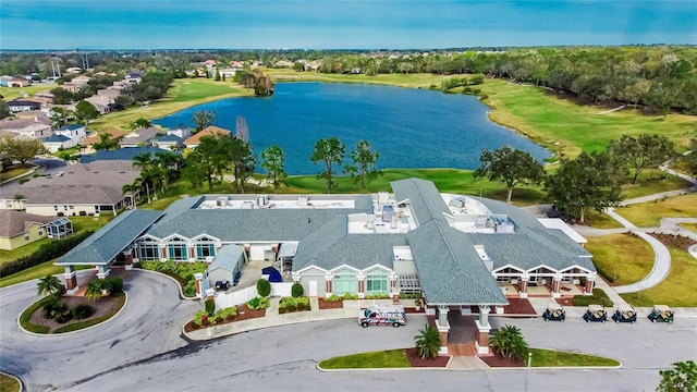 aerial view with a residential view and a water view