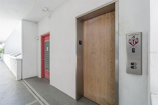 doorway to property with elevator