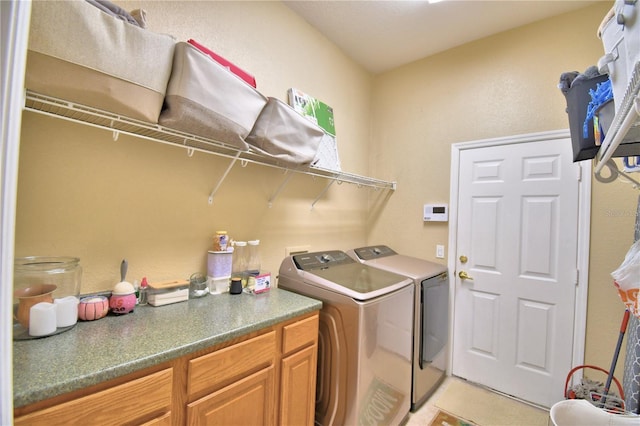 laundry area featuring laundry area and washer and dryer