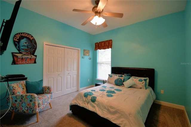 bedroom with carpet floors, a closet, ceiling fan, and baseboards