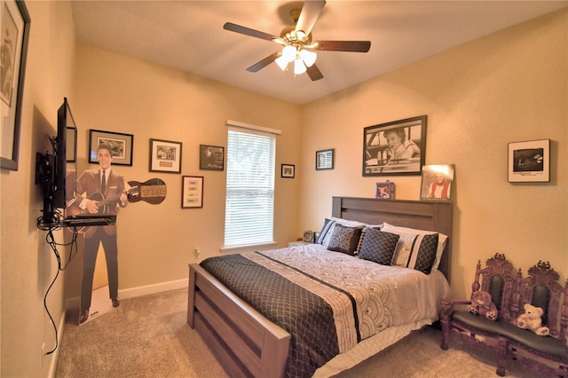 bedroom with carpet floors, ceiling fan, and baseboards