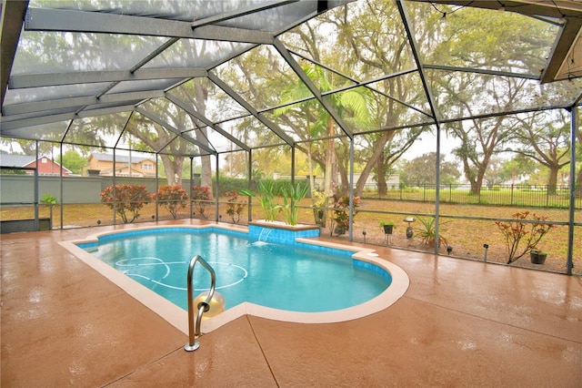 view of pool with a fenced in pool, glass enclosure, a patio area, and fence