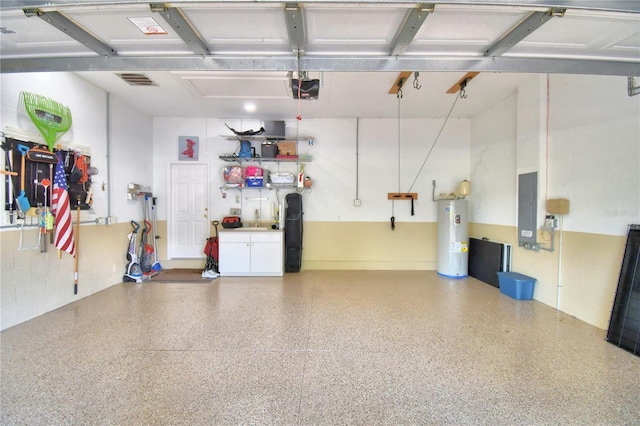 garage featuring electric panel, water heater, and a garage door opener