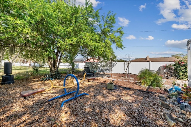 view of yard with a fenced backyard