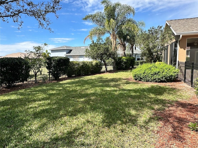 view of yard with fence