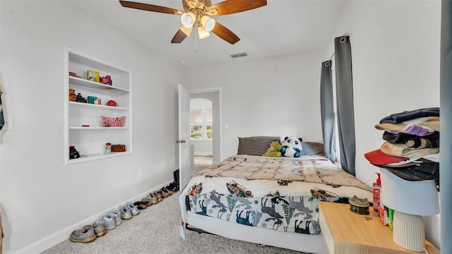 bedroom featuring baseboards, visible vents, ceiling fan, and carpet flooring