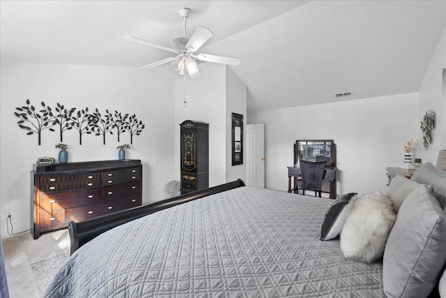 bedroom featuring ceiling fan, visible vents, and vaulted ceiling