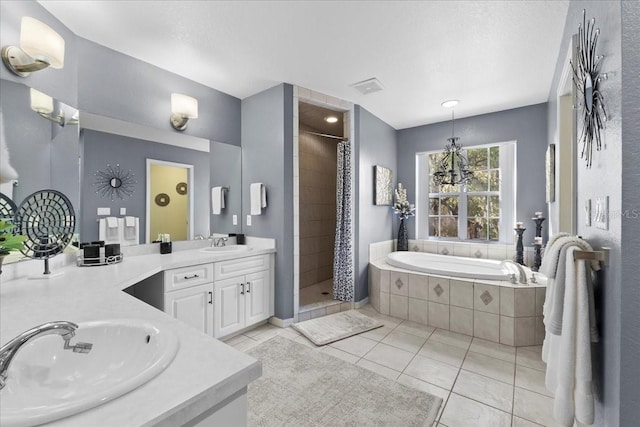 full bath with tile patterned flooring, visible vents, vanity, a shower stall, and a bath