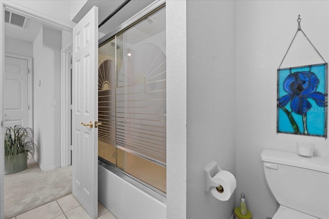 full bath featuring toilet, tile patterned flooring, and visible vents