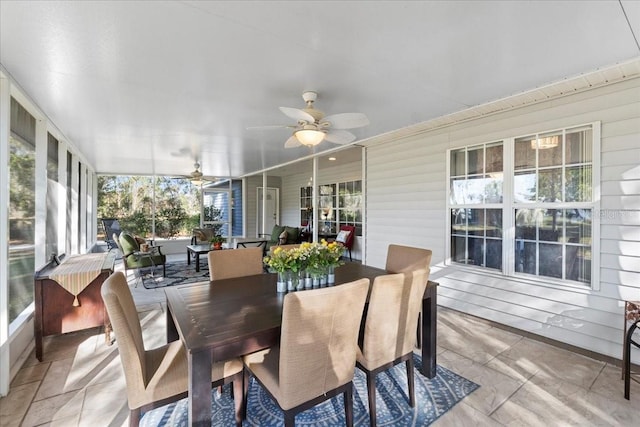 sunroom / solarium with ceiling fan