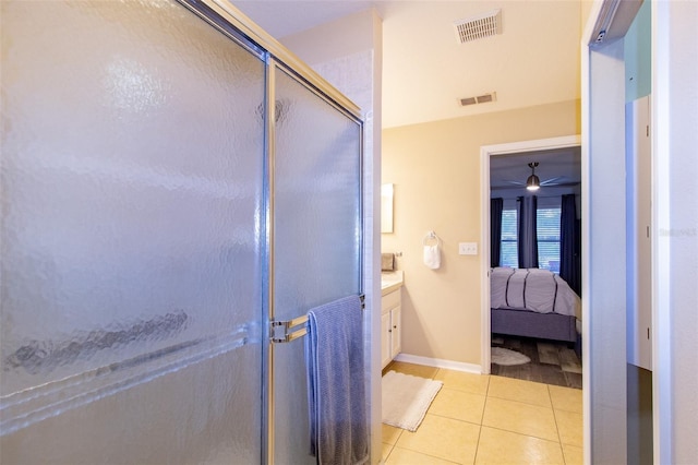 ensuite bathroom featuring tile patterned floors, connected bathroom, visible vents, and a stall shower