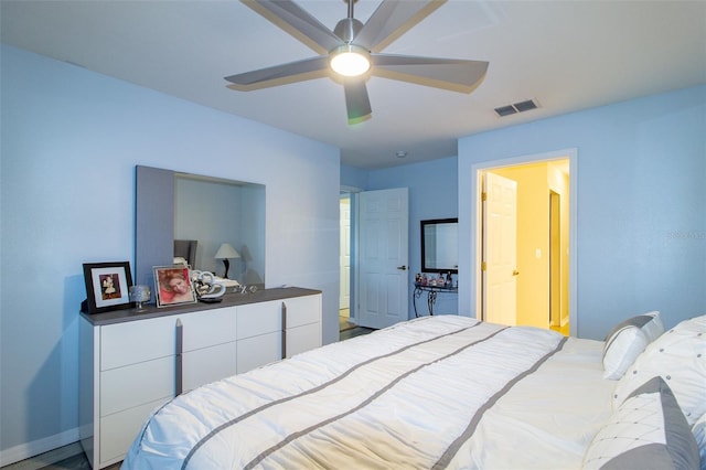 bedroom with a ceiling fan, baseboards, and visible vents