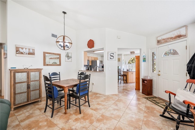 dining space with high vaulted ceiling, visible vents, a notable chandelier, and light tile patterned flooring