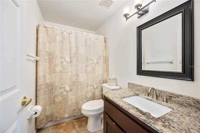 bathroom featuring toilet, a shower with shower curtain, vanity, and visible vents