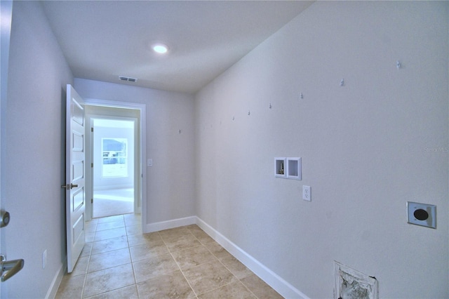 clothes washing area featuring washer hookup, hookup for an electric dryer, baseboards, and light tile patterned floors