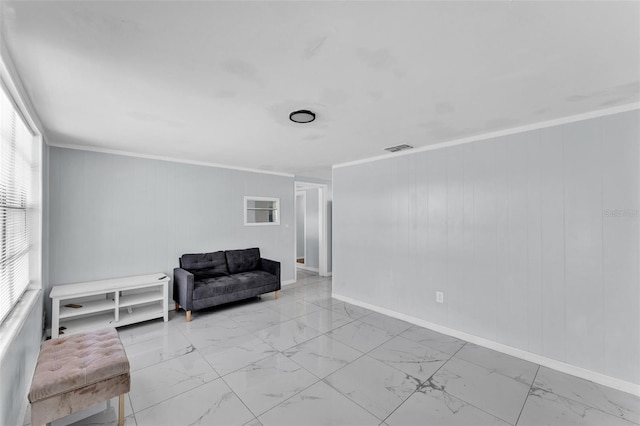 sitting room featuring baseboards, marble finish floor, visible vents, and crown molding