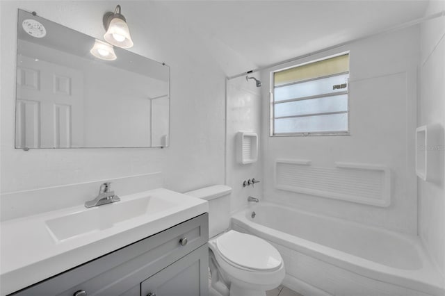 bathroom with toilet, bathing tub / shower combination, and vanity