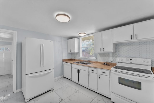 kitchen featuring white appliances, tasteful backsplash, marble finish floor, and a sink