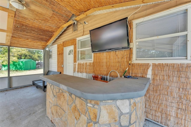 view of patio / terrace with an outbuilding