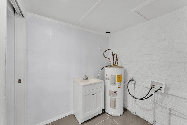 interior space with water heater and a sink