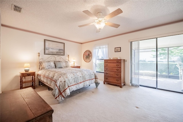 bedroom with light carpet, crown molding, visible vents, and access to exterior