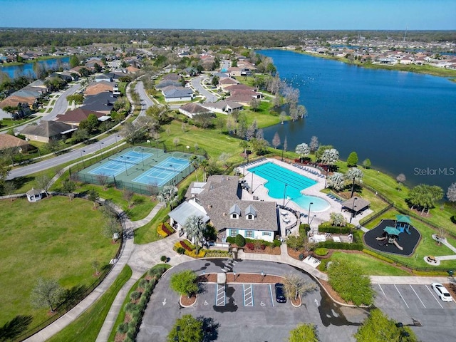 aerial view with a water view and a residential view