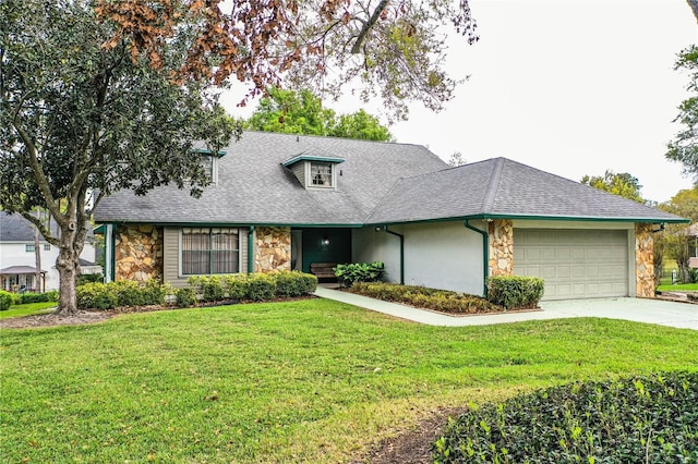 view of front of home featuring an attached garage, stone siding, driveway, roof with shingles, and a front yard