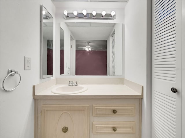 bathroom featuring vanity and ceiling fan