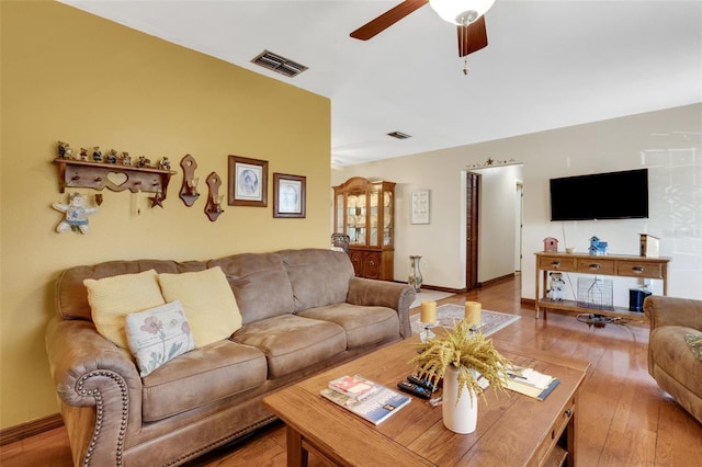 4643 1st St NW, Lakeland, FL 33810 - living area featuring ceiling fan, baseboards, light wood-style floors, and visible vents