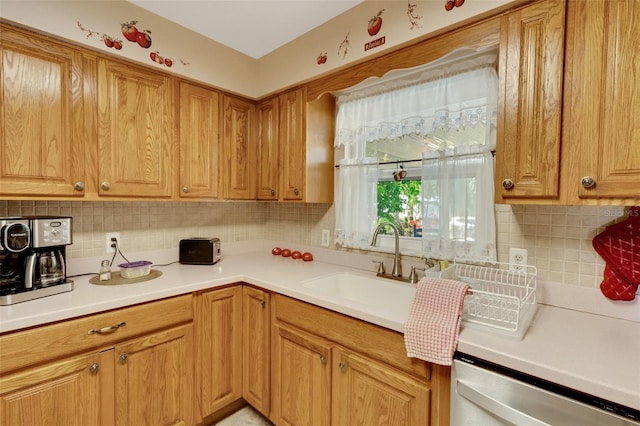 4643 1st St NW, Lakeland, FL 33810 - kitchen with light countertops, stainless steel dishwasher, decorative backsplash, and a sink