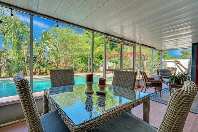 4643 1st St NW, Lakeland, FL 33810 - sunroom featuring outdoor dining area