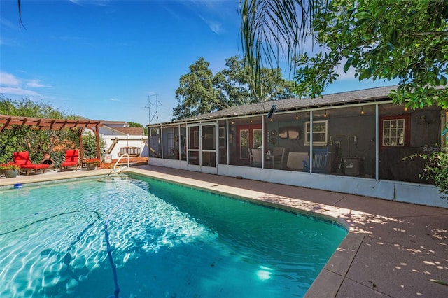 4643 1st St NW, Lakeland, FL 33810 - outdoor pool featuring a sunroom and a pergola