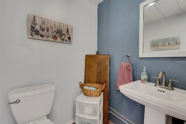 4643 1st St NW, Lakeland, FL 33810 - half bathroom featuring a sink and toilet