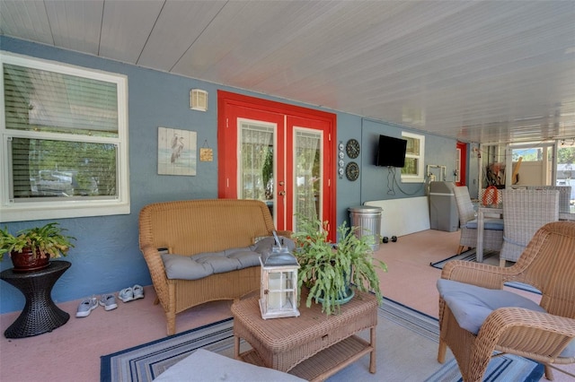4643 1st St NW, Lakeland, FL 33810 - living area featuring carpet floors and wooden ceiling