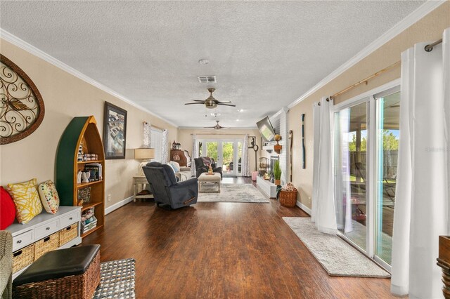 interior space featuring french doors, visible vents, and a ceiling fan