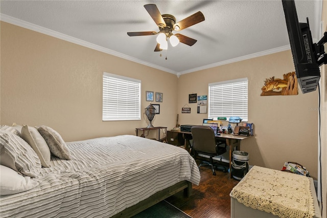 bedroom with ceiling fan, a textured ceiling, dark wood finished floors, and crown molding