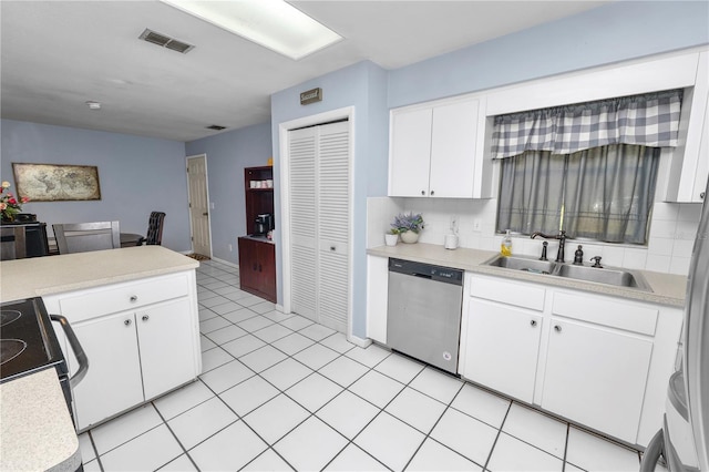 kitchen featuring electric range, a sink, visible vents, light countertops, and dishwasher