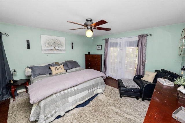 bedroom featuring ceiling fan and wood finished floors