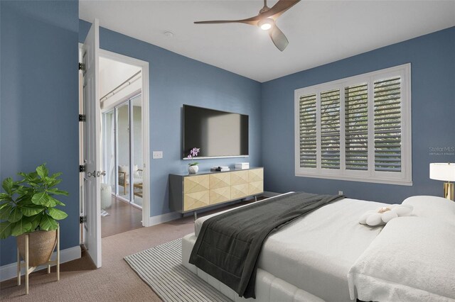 carpeted bedroom featuring a ceiling fan and baseboards