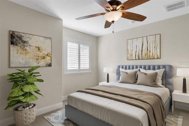 bedroom featuring ceiling fan, carpet flooring, visible vents, and baseboards