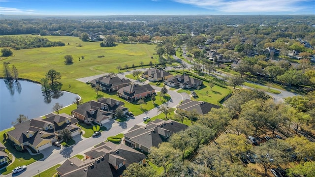 aerial view with a residential view and a water view