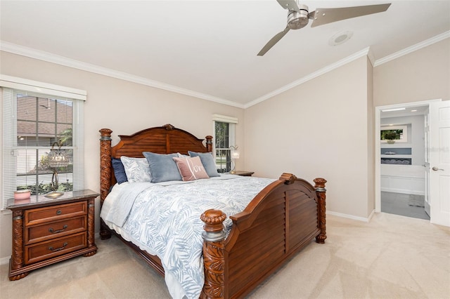 bedroom with crown molding, light colored carpet, a ceiling fan, connected bathroom, and baseboards