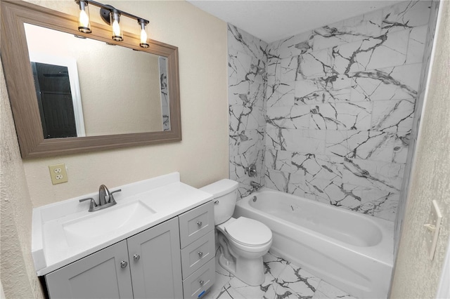 full bath with toilet, marble finish floor, bathing tub / shower combination, and vanity