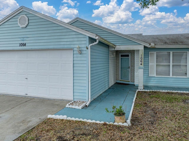 view of front of home featuring an attached garage