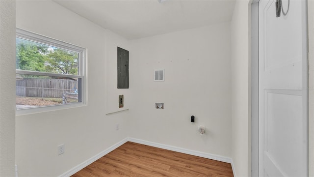 washroom with laundry area, baseboards, wood finished floors, hookup for an electric dryer, and washer hookup